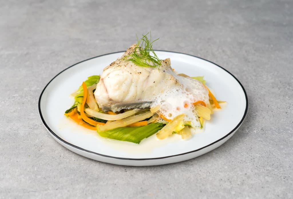 Steamed giant grouper fillet on vegetables