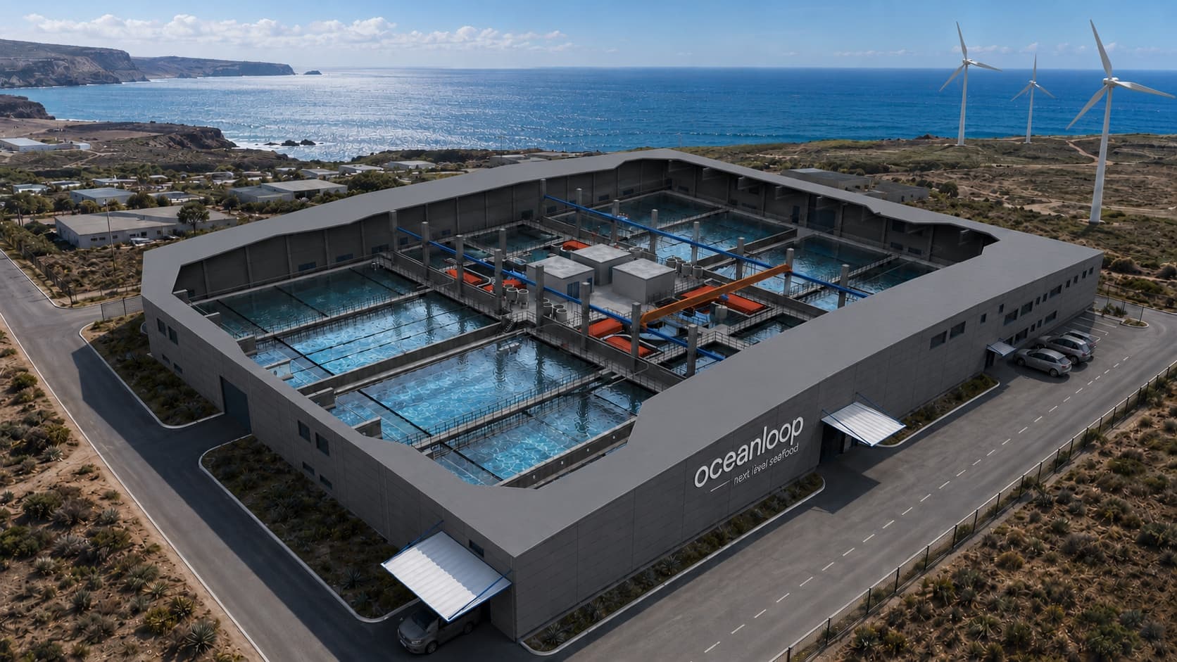 An Oceanloop farm on the coast, its raceway basins open to the sky